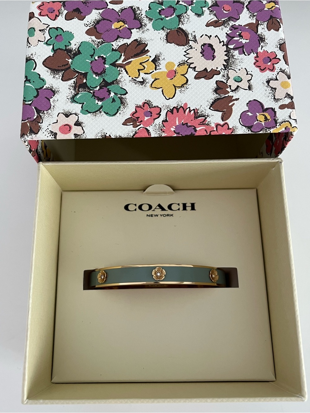 Coach Gold Tone Floral Enamel Hinged Bangle Bracelet Muted Blue-Green Jade Color